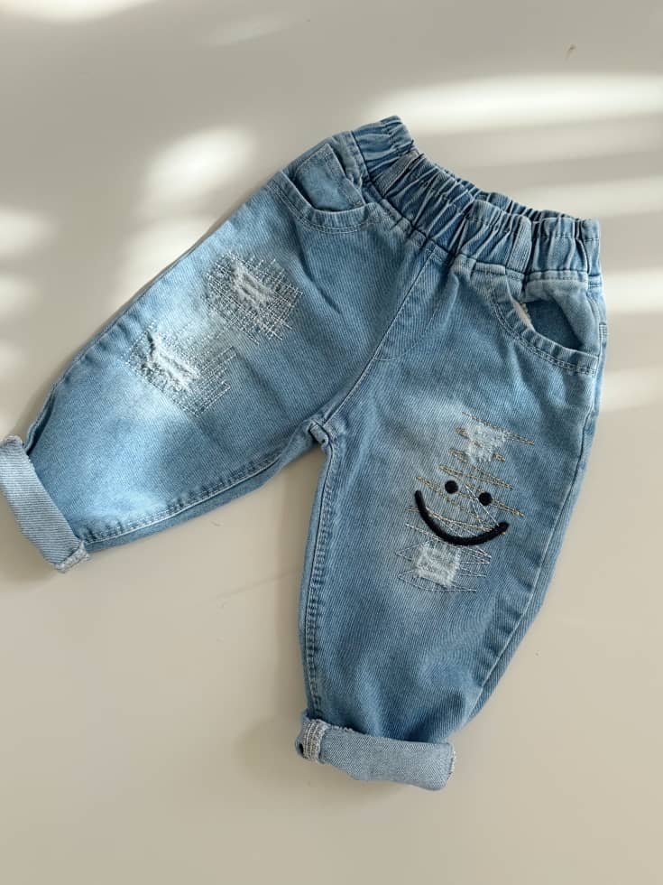 شلوار جین آبی روشن طرح لبخند